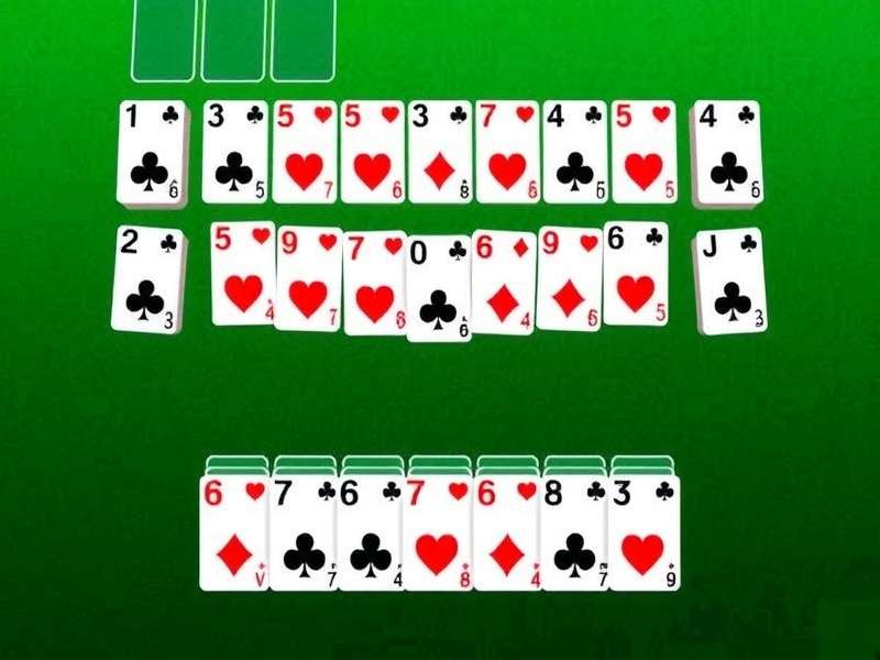 Strategic view of a Freecell Solitaire game on a green felt background, showing card columns and free cells
