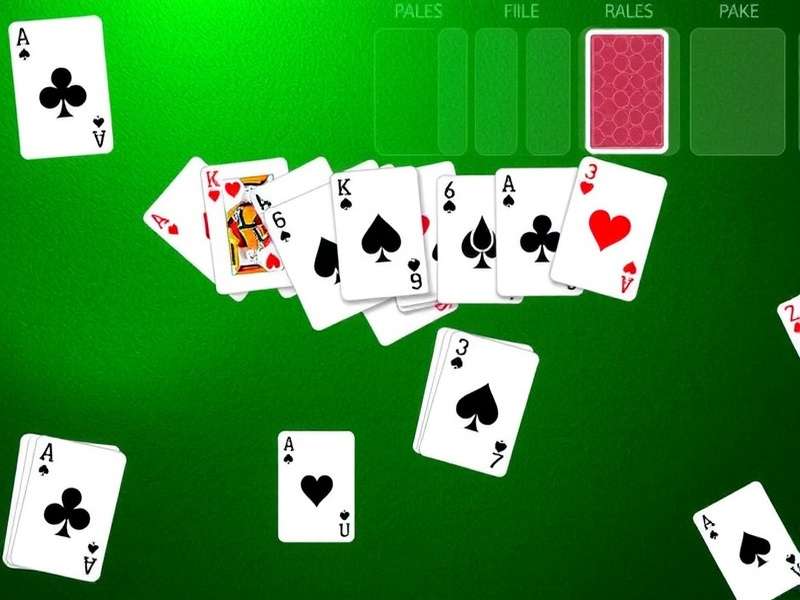 Klondike Solitaire Green Felt Turn 3 game layout showing cards on green felt with three-card draw